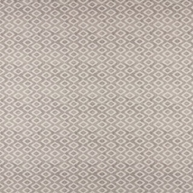 Close-up of pebble beige geometric woven fabric with small ivory diamonds