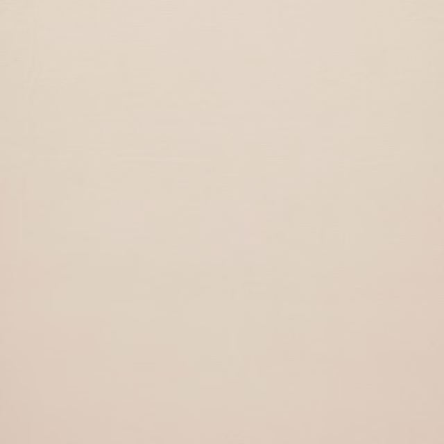 Pale nougat cream plain upholstery fabric with a smooth matte weave
