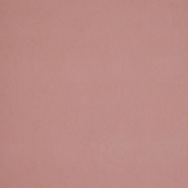 Soft dusty rose plain weave fabric with a smooth matte surface
