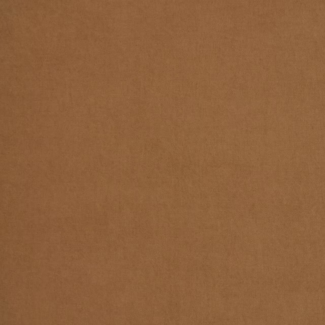 Warm tan plain woven fabric with a smooth matte texture