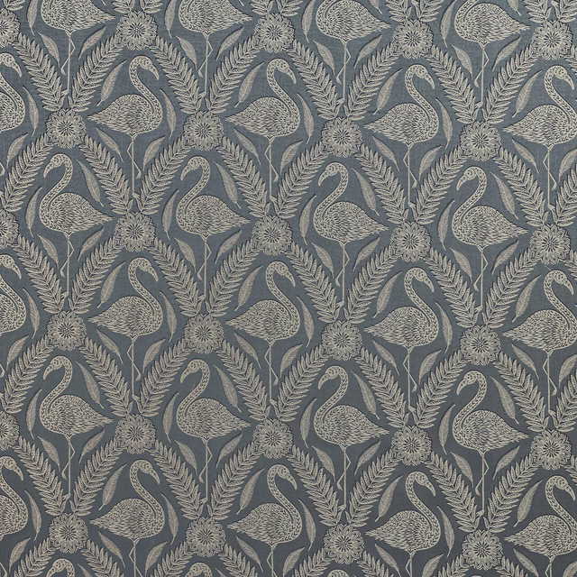 Slate blue patterned fabric with cream birds, leafy stems and floral motifs