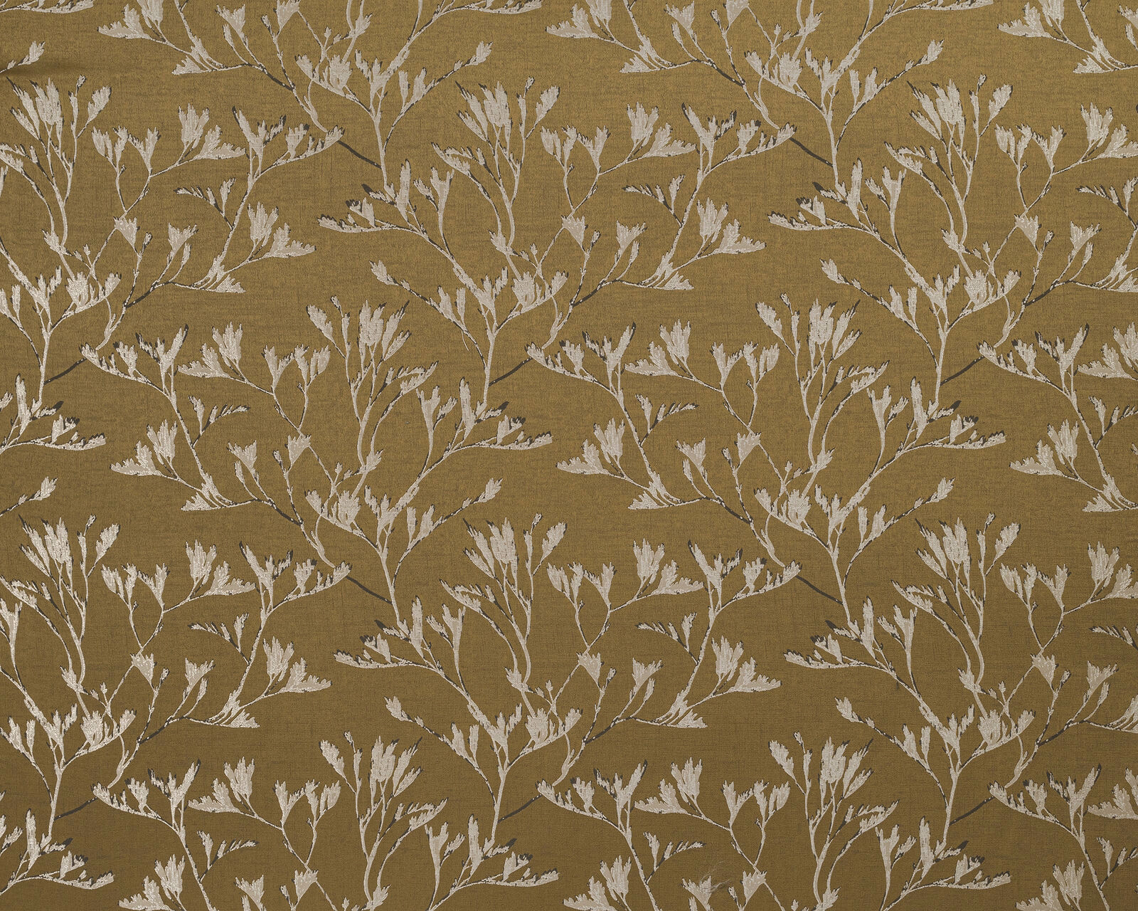 Ochre botanical drapery fabric with pale trailing leaf branches