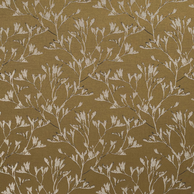 Ochre botanical drapery fabric with pale trailing leaf branches