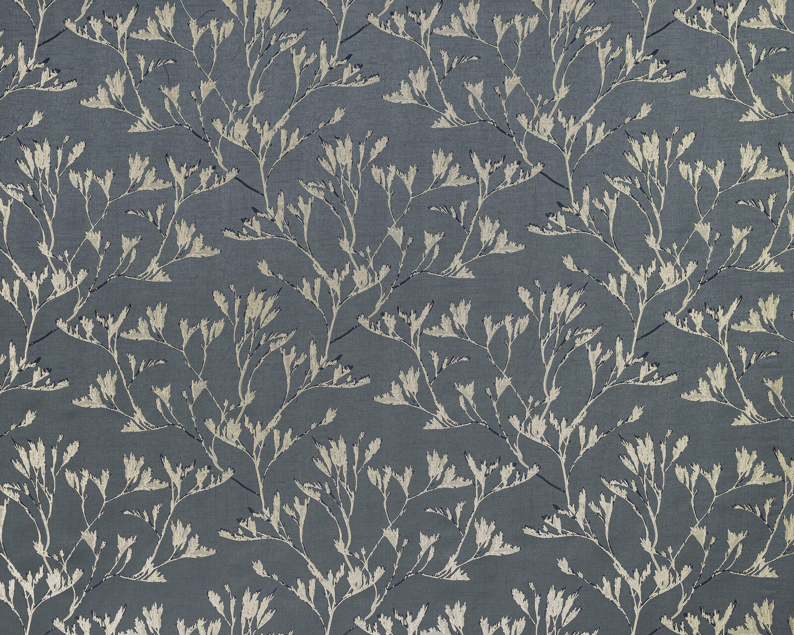 Slate blue botanical drapery fabric with cream trailing leaf stems