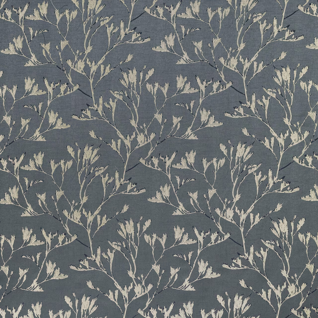 Slate blue botanical drapery fabric with cream trailing leaf stems