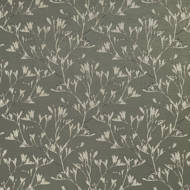 Sage green botanical drapery fabric with pale leafy trailing branches