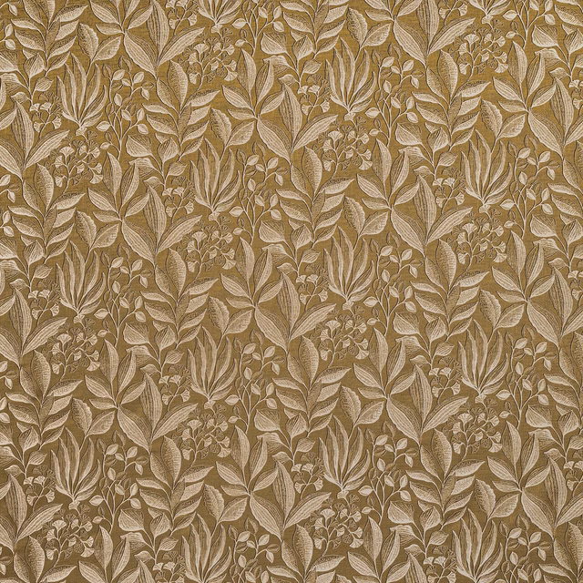 Ochre botanical curtain fabric with layered pale leaf motifs on a warm gold ground