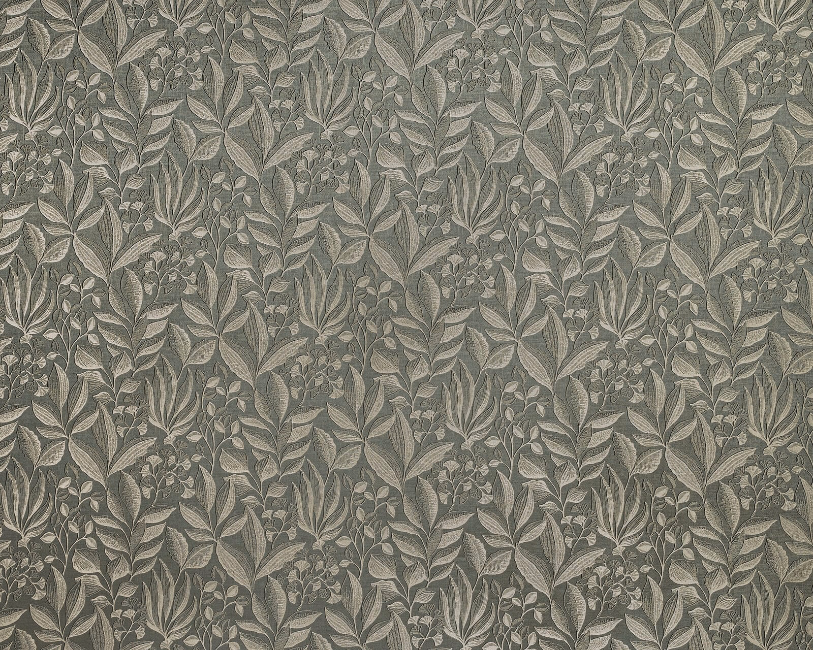 Muted sage green botanical fabric with layered leaves and small floral clusters