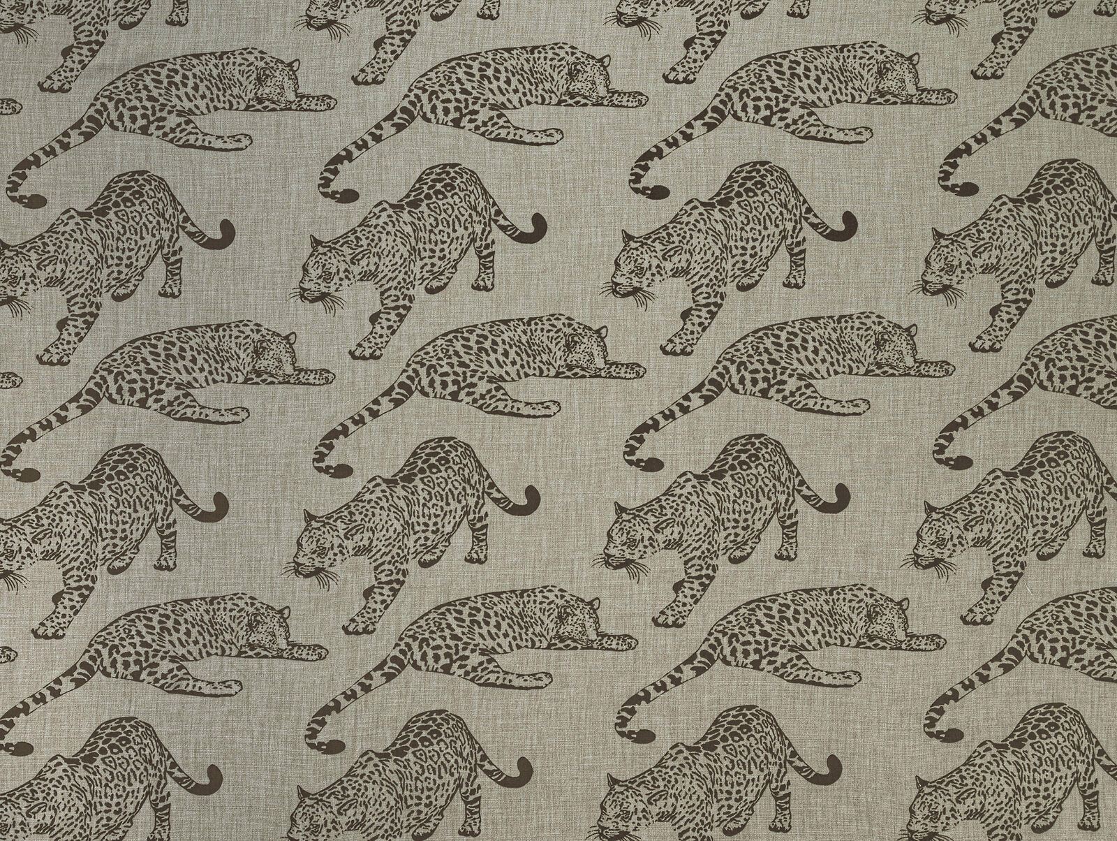 Beige drapery fabric with tonal leopard cats and a linen-look weave