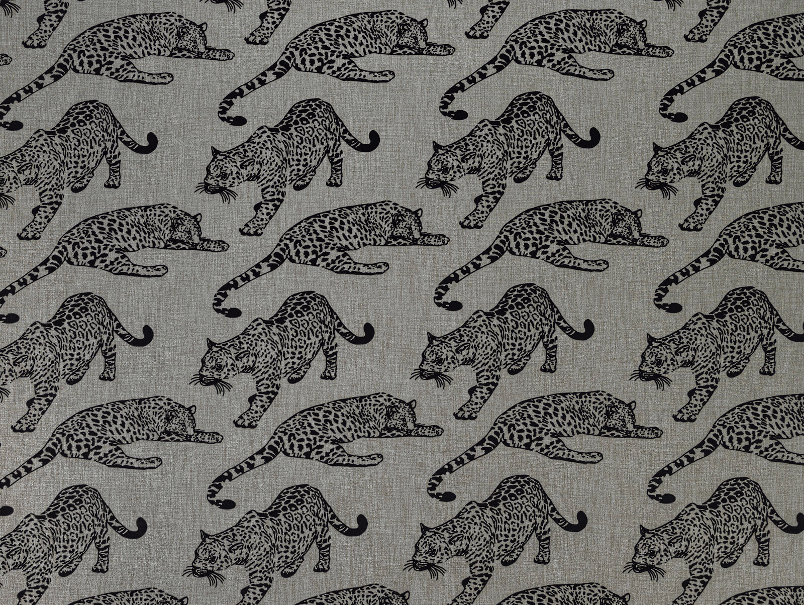Grey woven fabric with black leaping leopard print