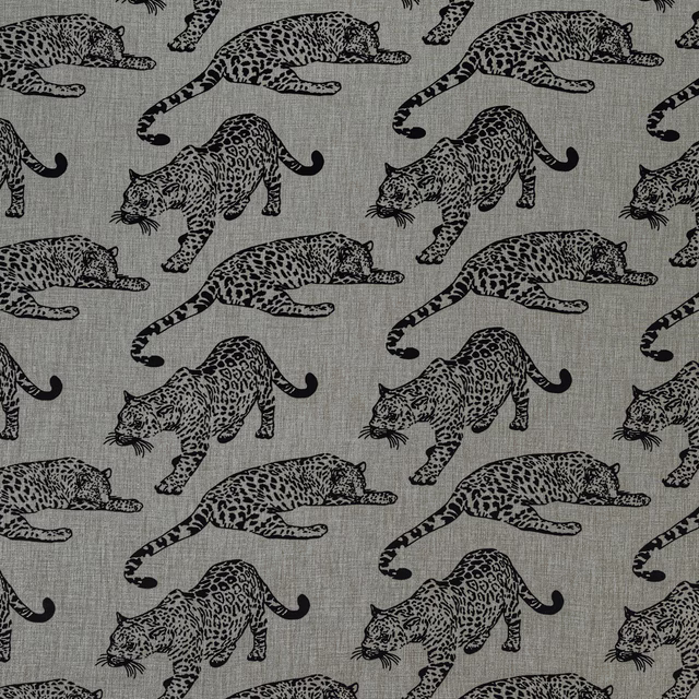 Grey woven fabric with black leaping leopard print