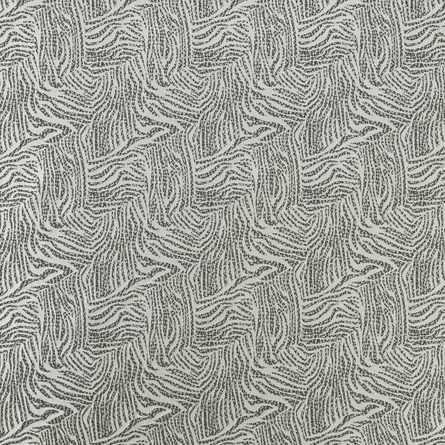 Close-up of grey textured woven fabric with layered zebra-like pattern