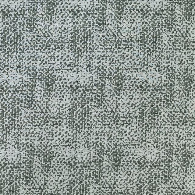 Pale sage green textured fabric with small tonal spotted animal pattern