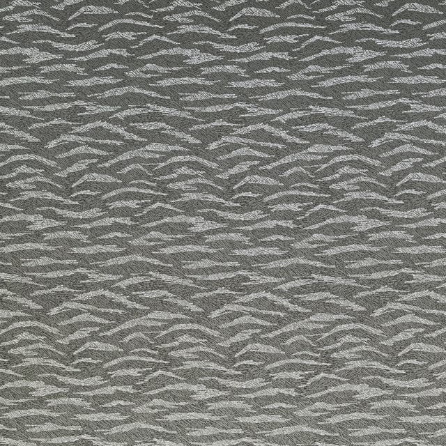 Grey textured woven fabric with pale abstract animal-like motif