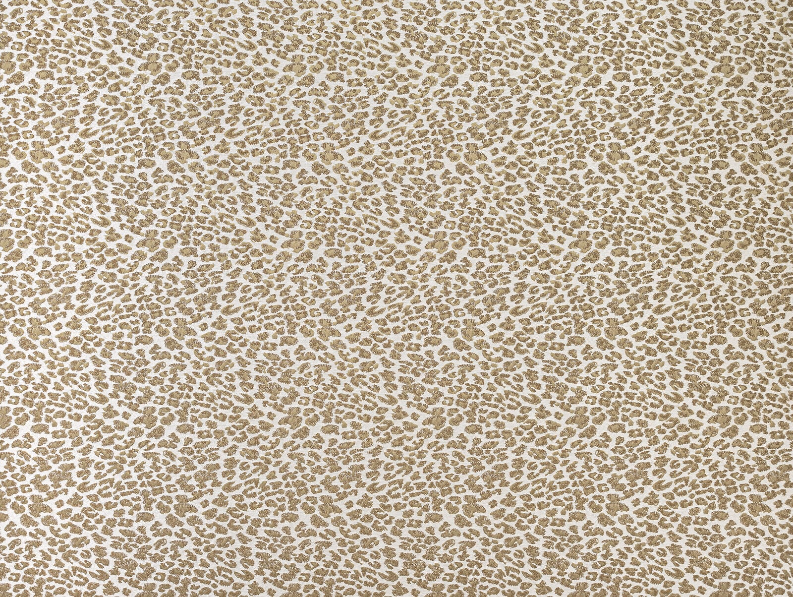 Pale sandy beige fabric with small tan leopard-style spots