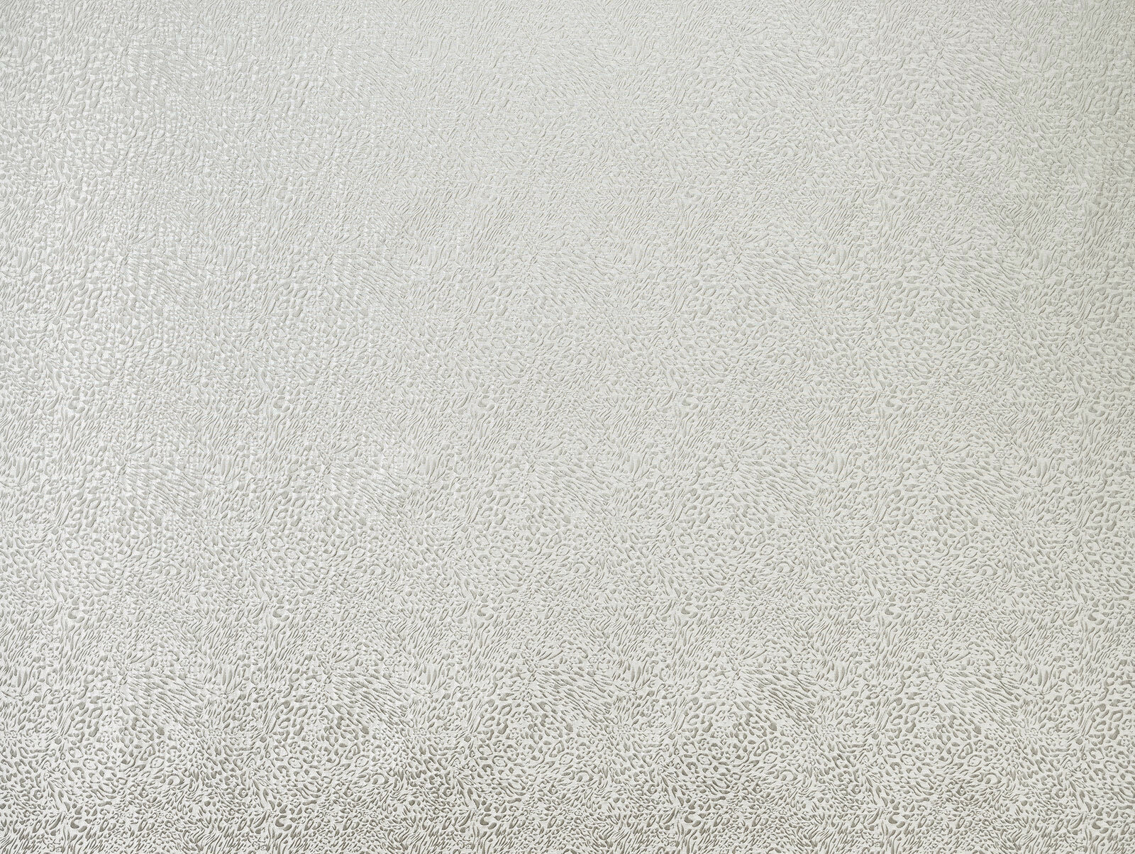 Ivory textured animal-pattern fabric with a subtle tonal repeat
