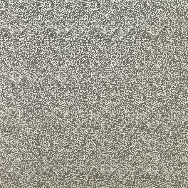 Close-up of muted olive truffle textured fabric with dense small-scale pattern