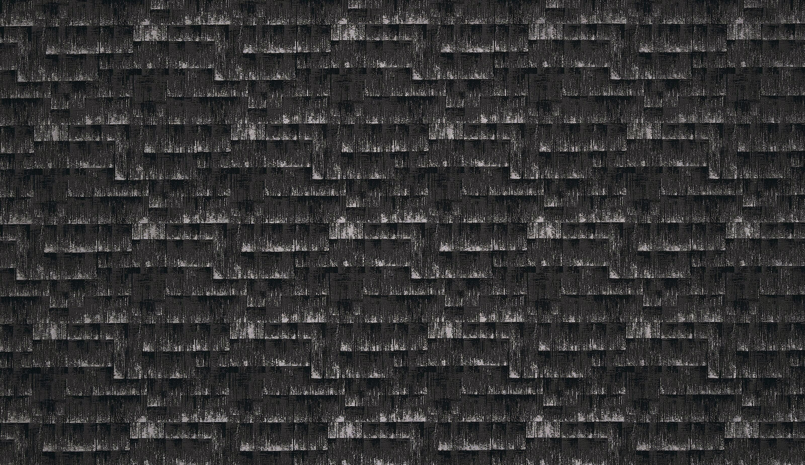 Charcoal grey textured geometric fabric with layered woven blocks