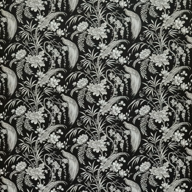 Black fabric with ivory botanical birds, flowers and foliage in a large repeat
