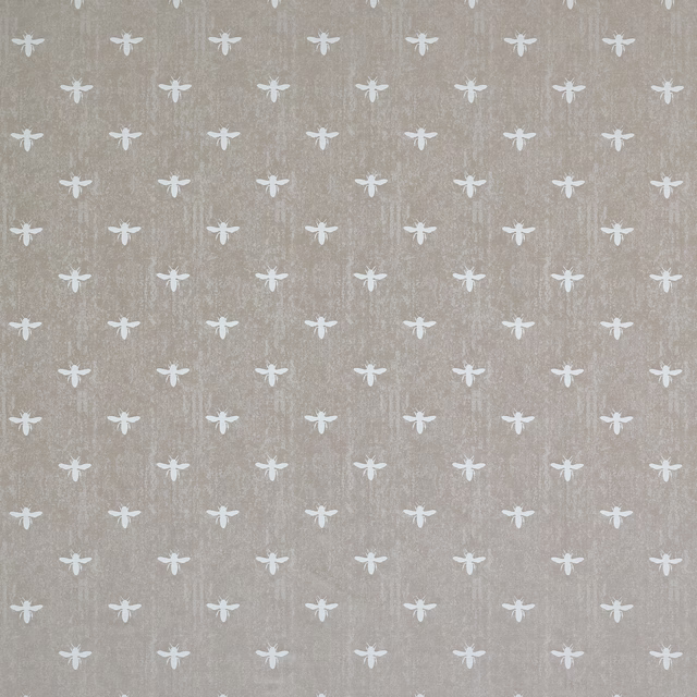 Beige linen-look fabric with small white animal motifs in a neat scattered repeat