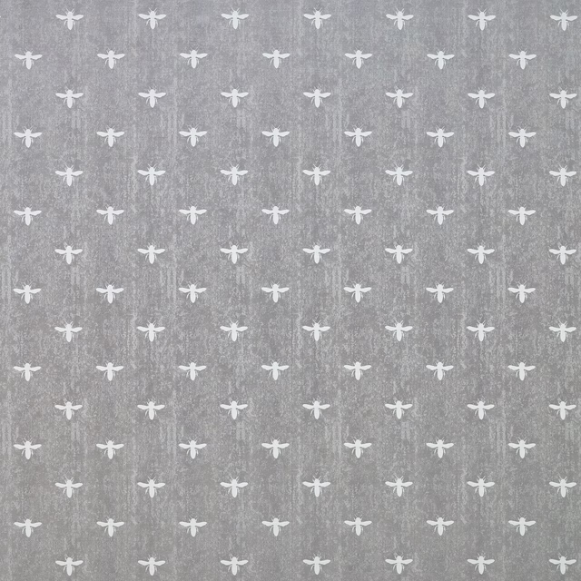 Silver-grey patterned fabric with small white insect-like motifs on a softly textured ground
