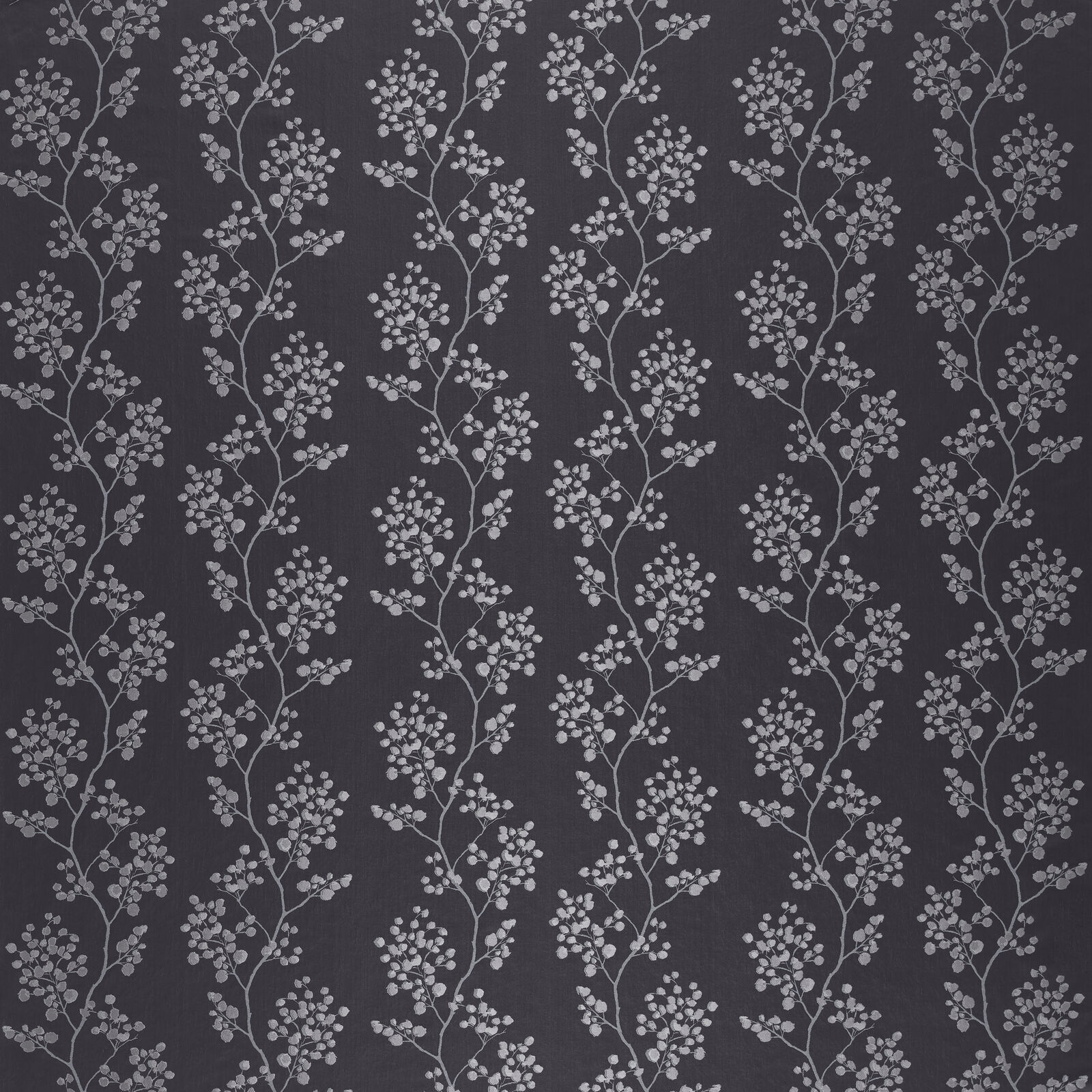 Dark charcoal botanical fabric with slim trailing leaf sprigs in soft grey