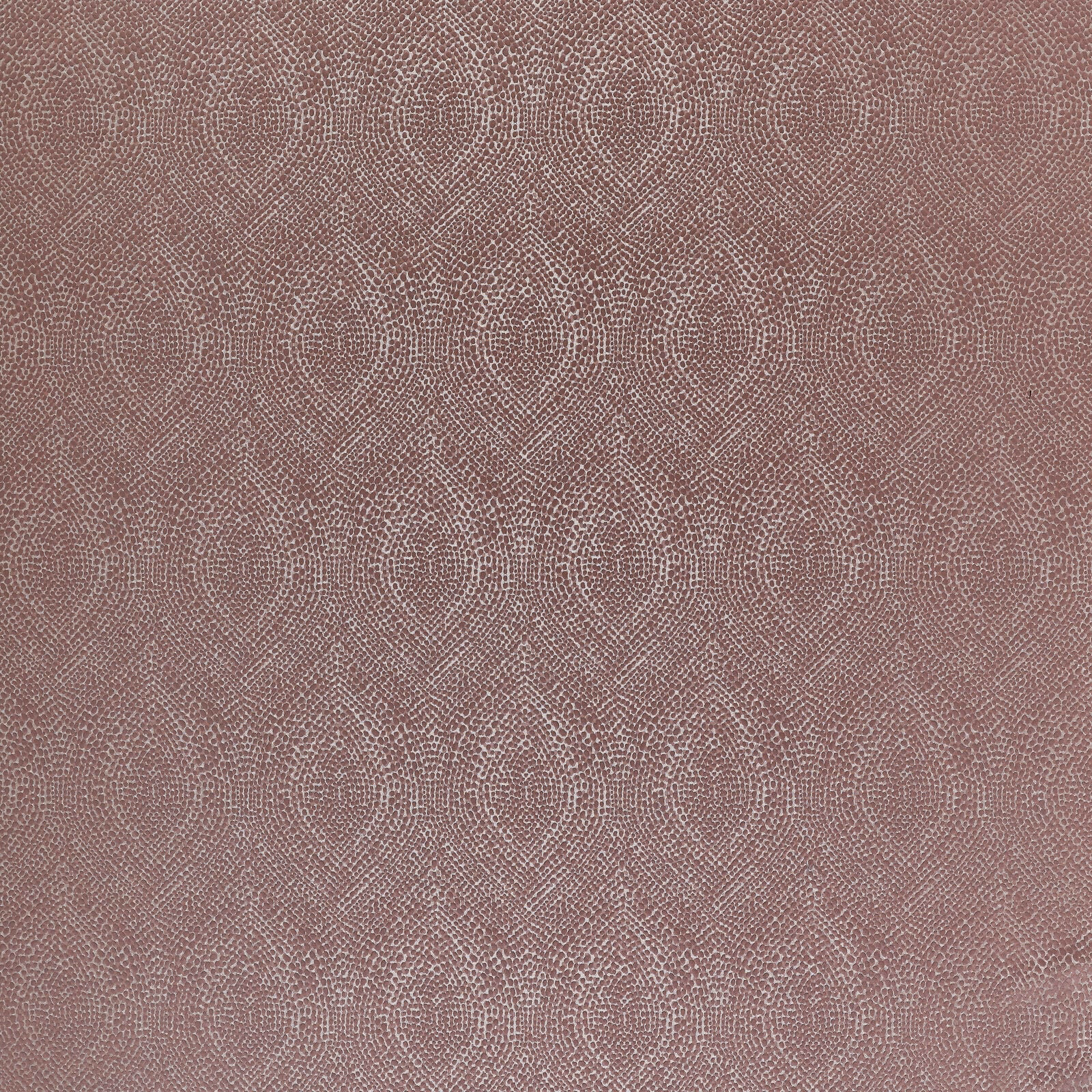Dusty rose textured fabric with repeating circular geometric medallions