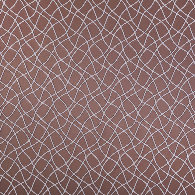 Muted rose terracotta fabric with pale interlocking geometric lines