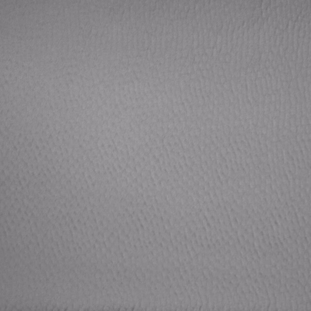 Soft graphite grey textured fabric swatch with fine tonal weave