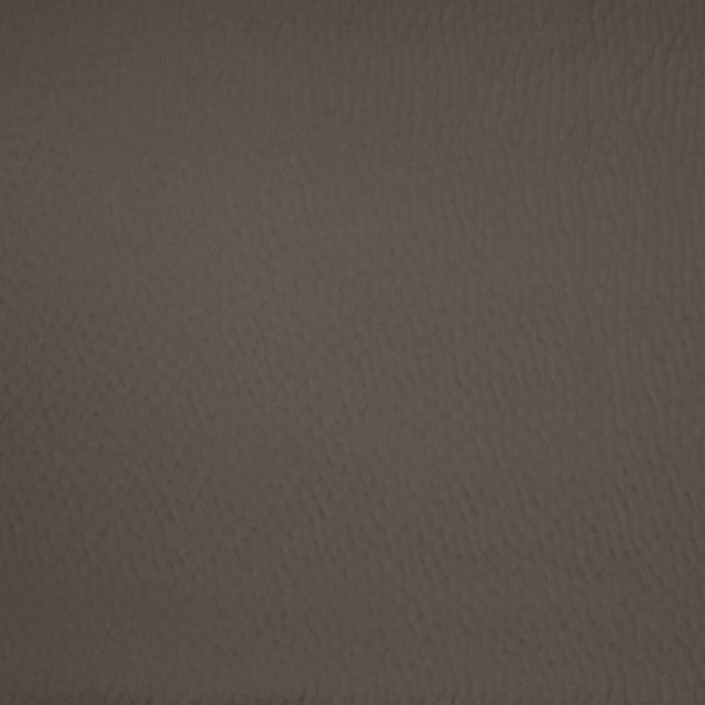 Close-up of a warm mink taupe textured woven fabric swatch