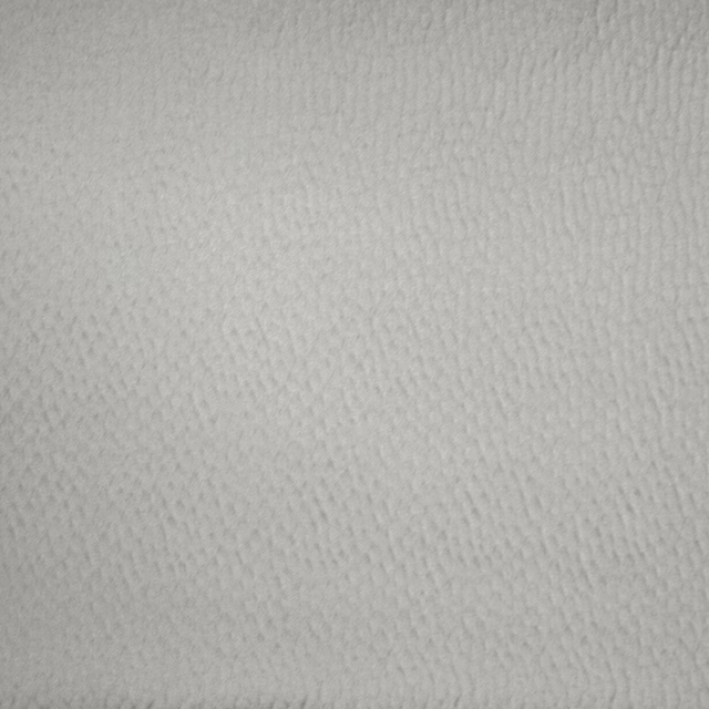 Close-up of soft steel grey woven fabric with a fine pebbled texture