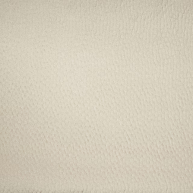 Close-up of a soft cream textured fabric with subtle woven grain
