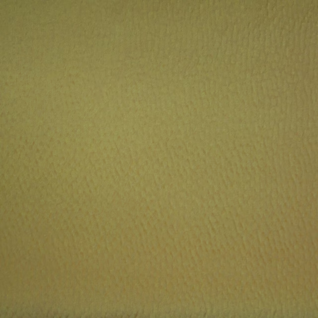 Soft muted yellow-green textured plain fabric swatch