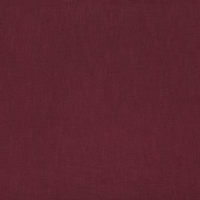 Deep claret plain woven fabric swatch with a soft matte texture