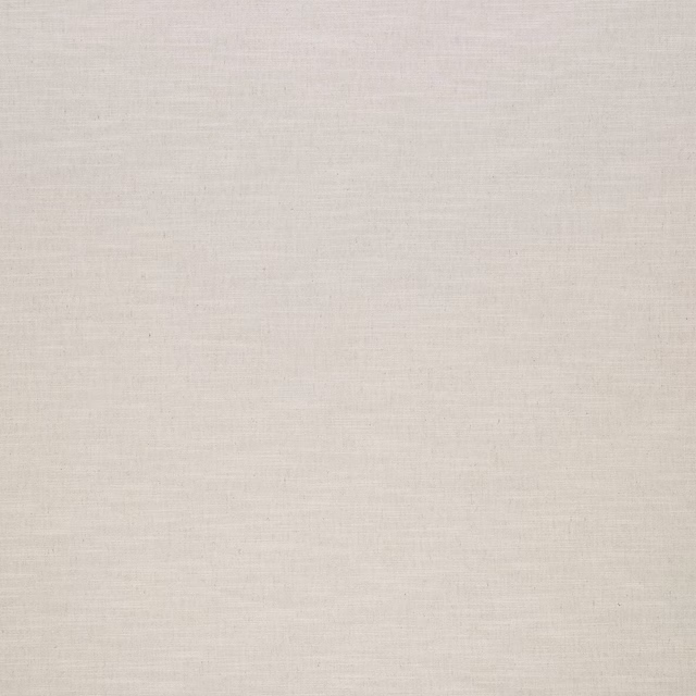 Close-up of a soft ivory plain weave fabric with subtle linen texture