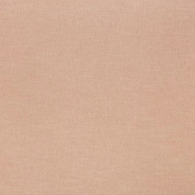 Soft nude pink plain woven fabric with a subtle linen texture