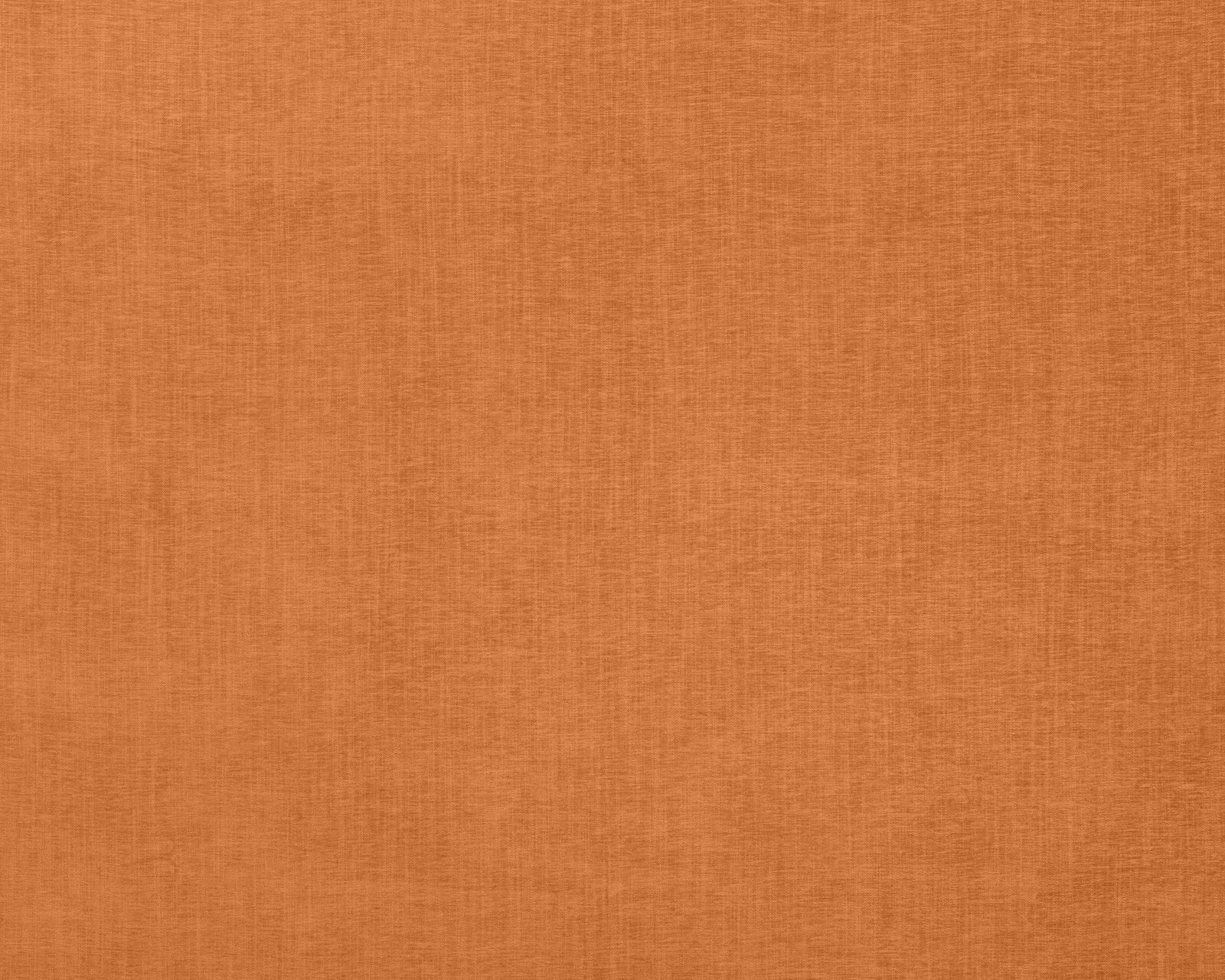 Plain warm clementine orange fabric with fine woven texture