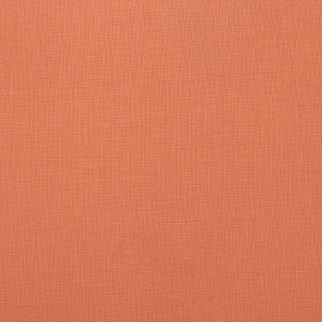 Warm coral plain weave fabric with a subtle linen texture