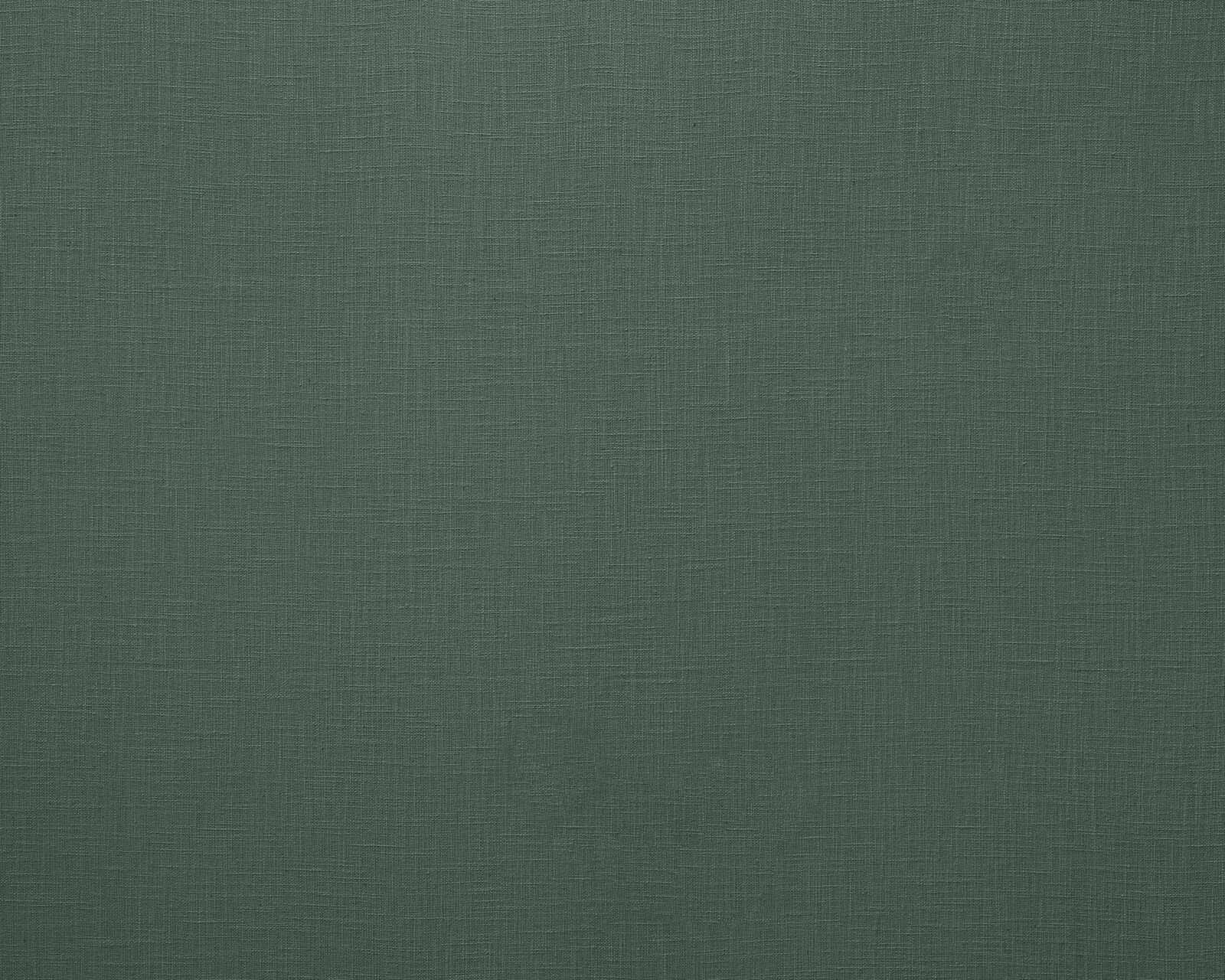 Plain emerald green woven fabric swatch with a fine natural slub texture