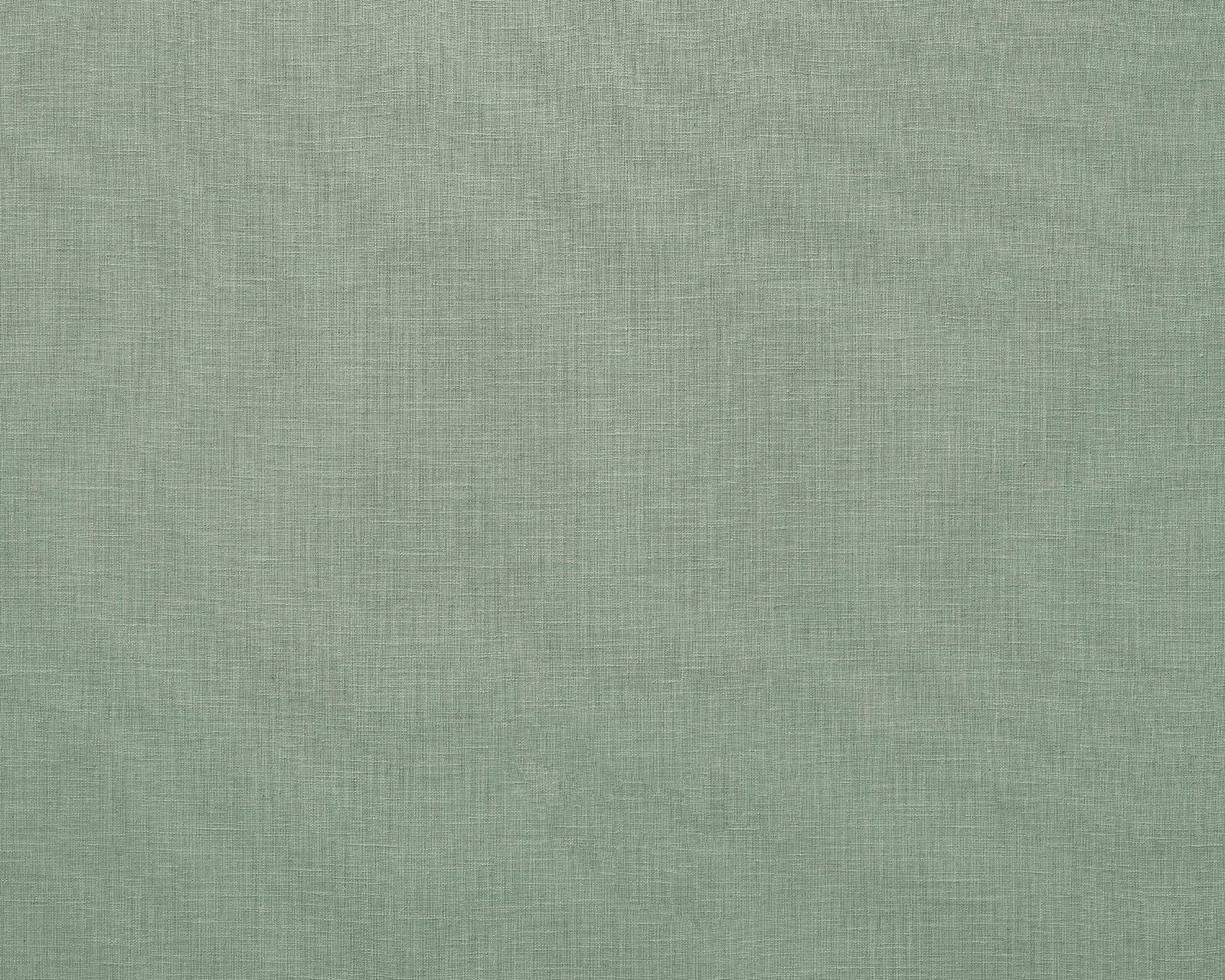 Soft jade green plain woven fabric with a fine linen texture