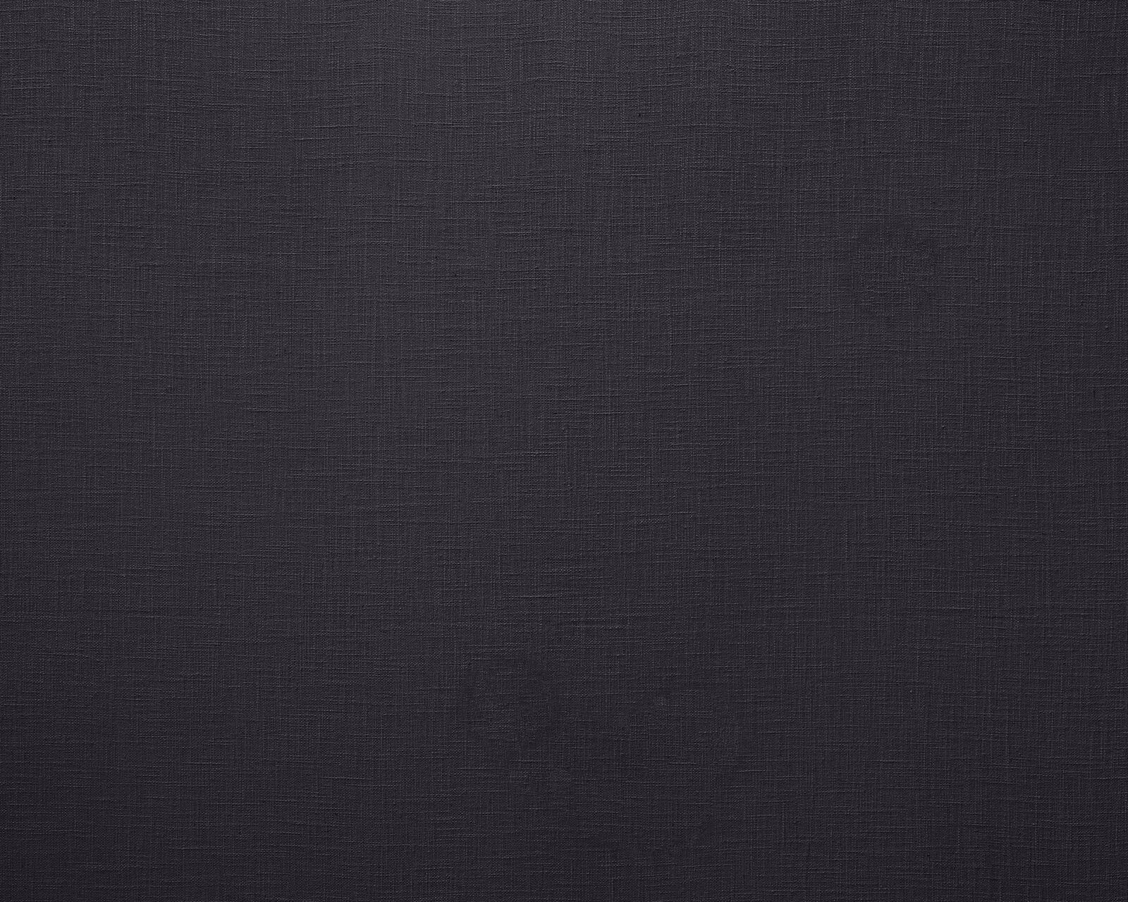 Dark charcoal plain woven fabric swatch with fine linen texture