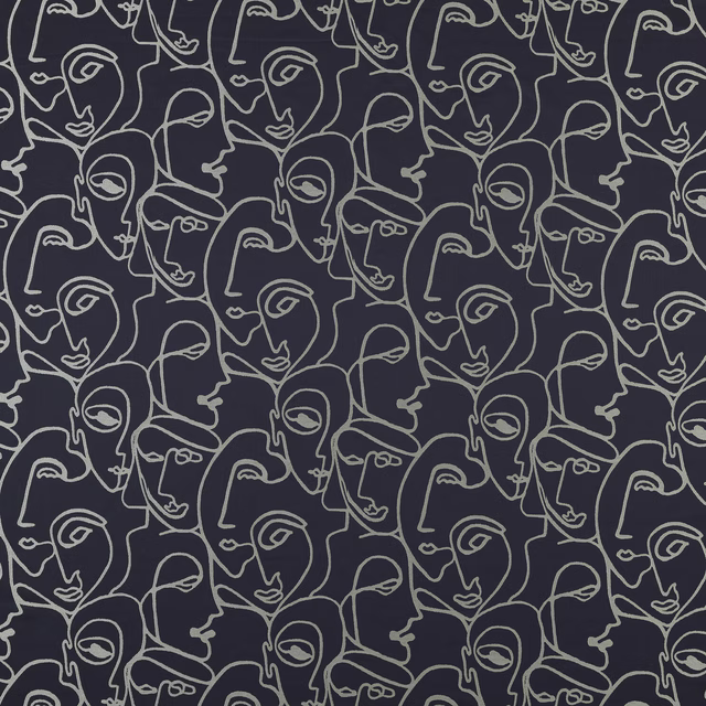 Deep sapphire fabric with repeating ivory line-drawn abstract faces