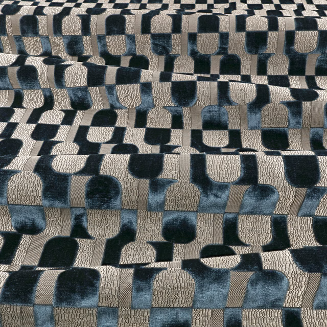 Ink-blue, black and oatmeal geometric blocks with a plush, textured woven surface