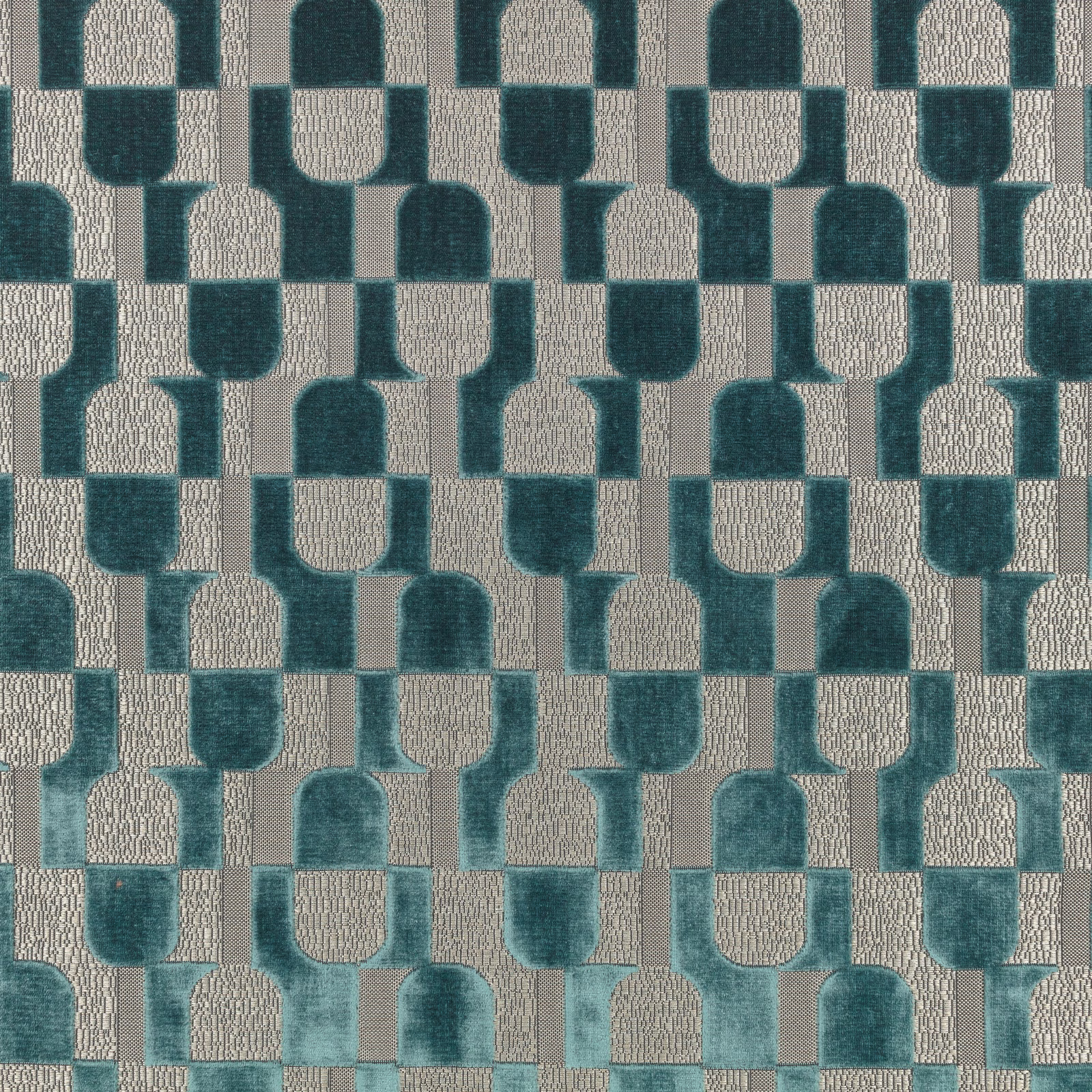Deep teal and stone geometric arch blocks with a visibly textured surface