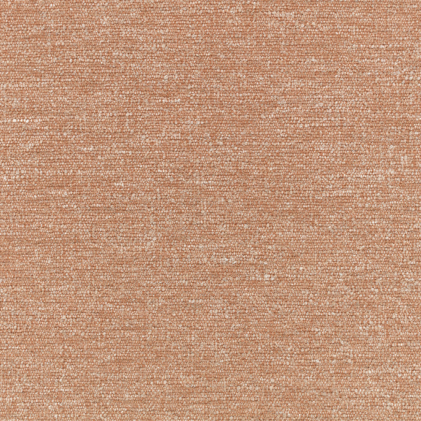 Close-up of dusty peach terracotta woven fabric with fine flecks and nubby texture