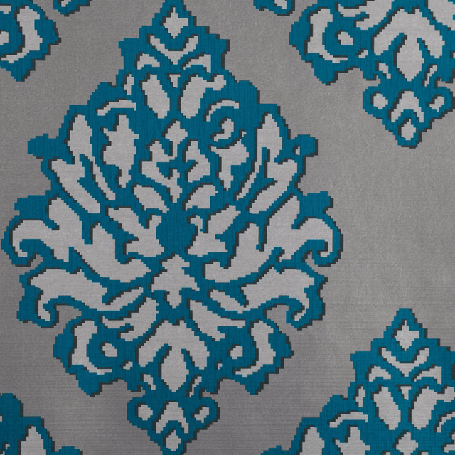 Large verditer teal damask motifs on a finely textured cool grey wallpaper ground