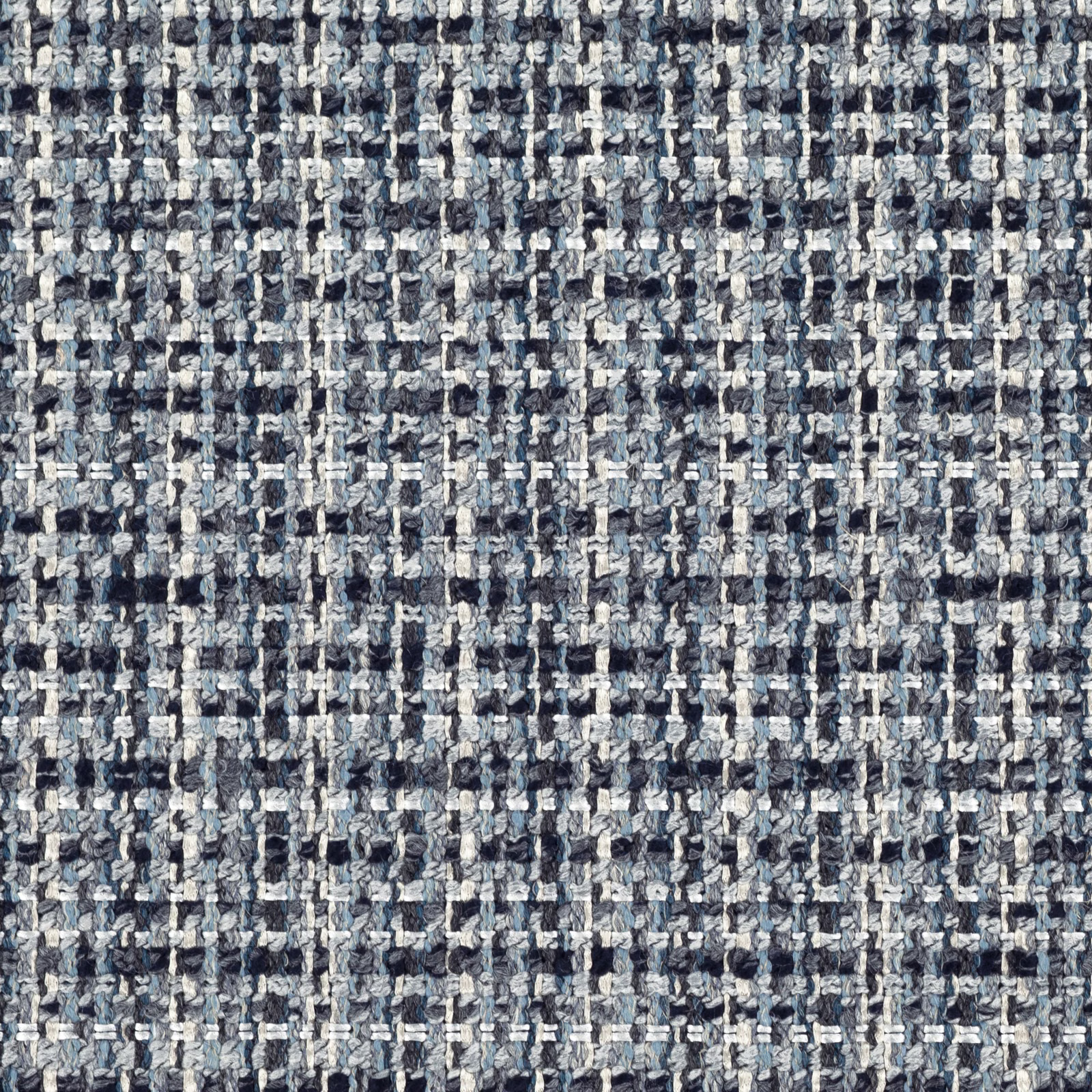 Close-up of Kiriko Storm’s blue-grey nubby weave with charcoal and ivory flecks