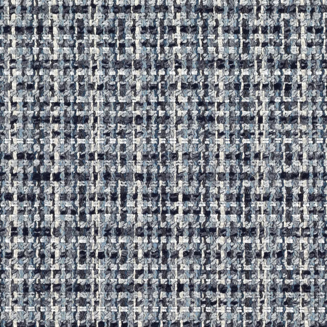 Close-up of Kiriko Storm’s blue-grey nubby weave with charcoal and ivory flecks