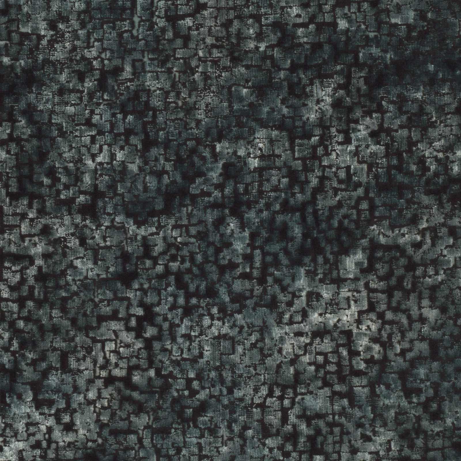 Dark eucalyptus green fabric with charcoal geometric flecks and a distressed woven texture