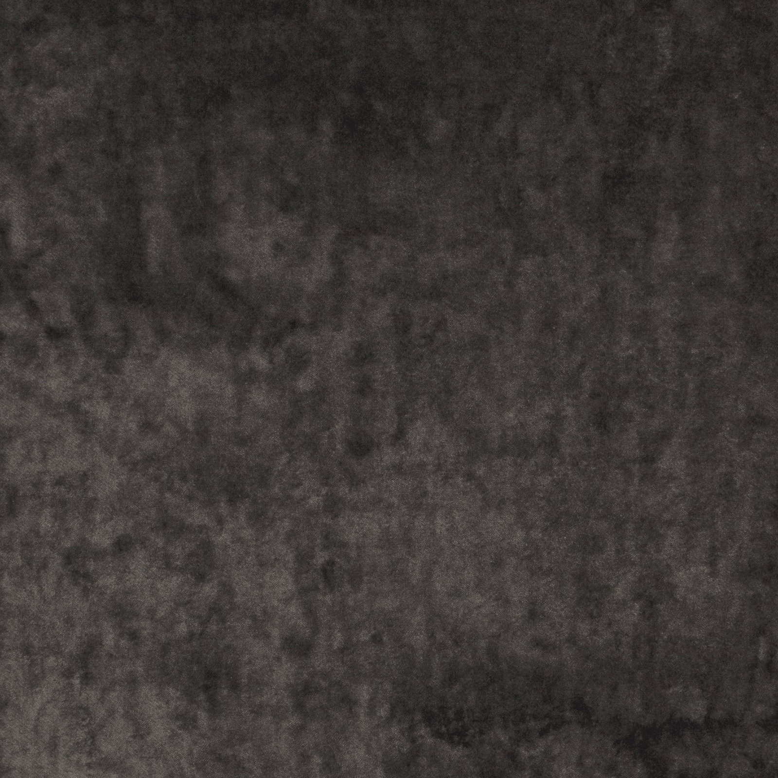 Close-up of anthracite grey fabric with softly mottled, shadowed surface texture